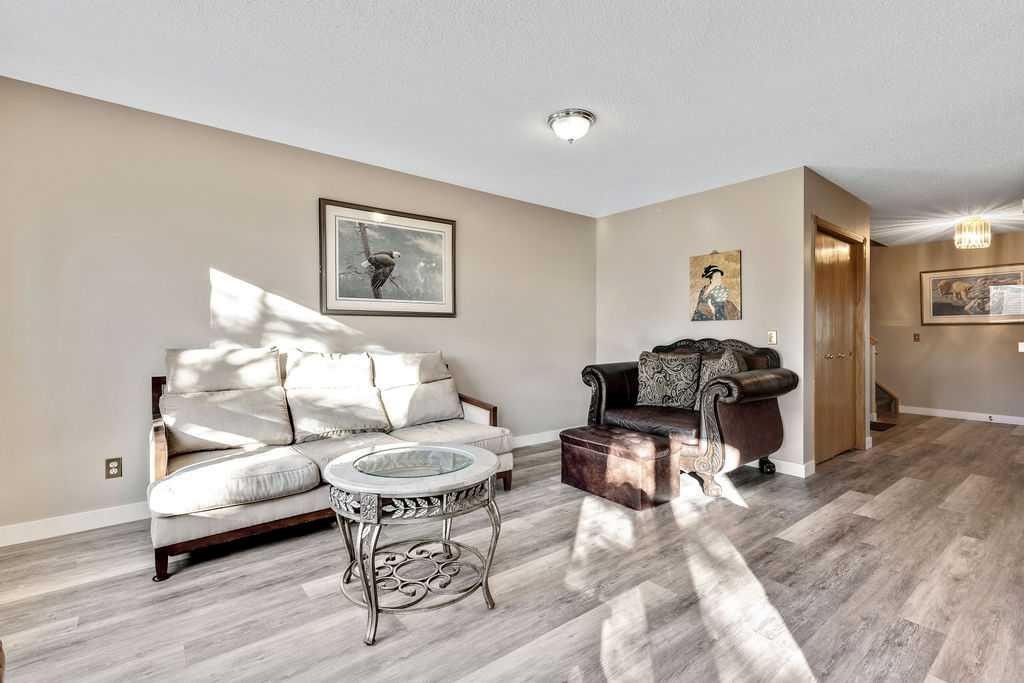 166 Harvest Rose Circle Ne, Calgary, AB - Indoor Photo Showing Living Room