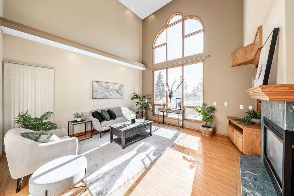 109 Lakeside Greens Drive, Chestermere, AB - Indoor With Fireplace