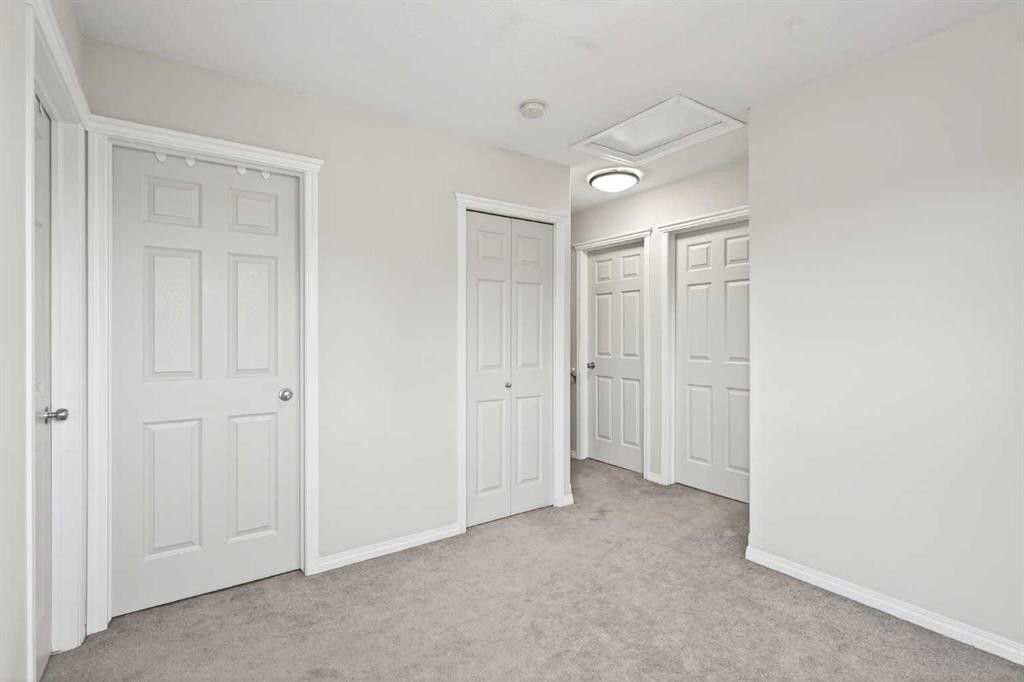 21-102 Canoe Square Sw, Airdrie, AB - Indoor Photo Showing Other Room