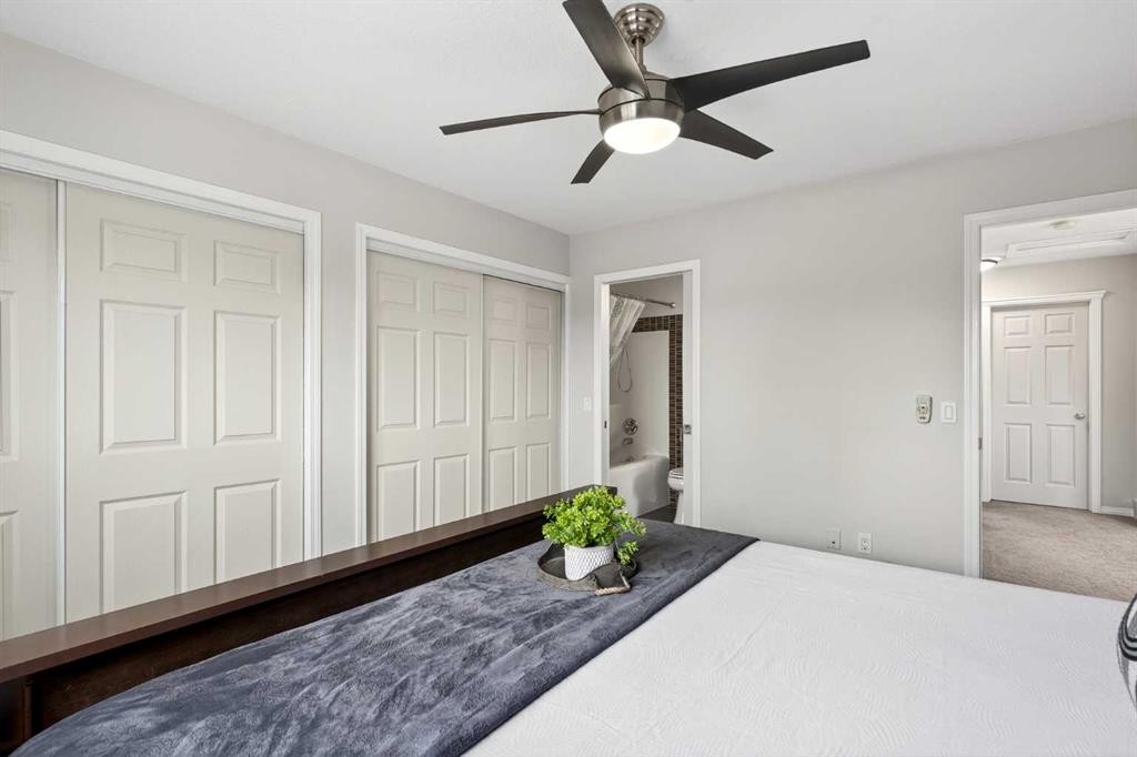 21-102 Canoe Square Sw, Airdrie, AB - Indoor Photo Showing Bedroom