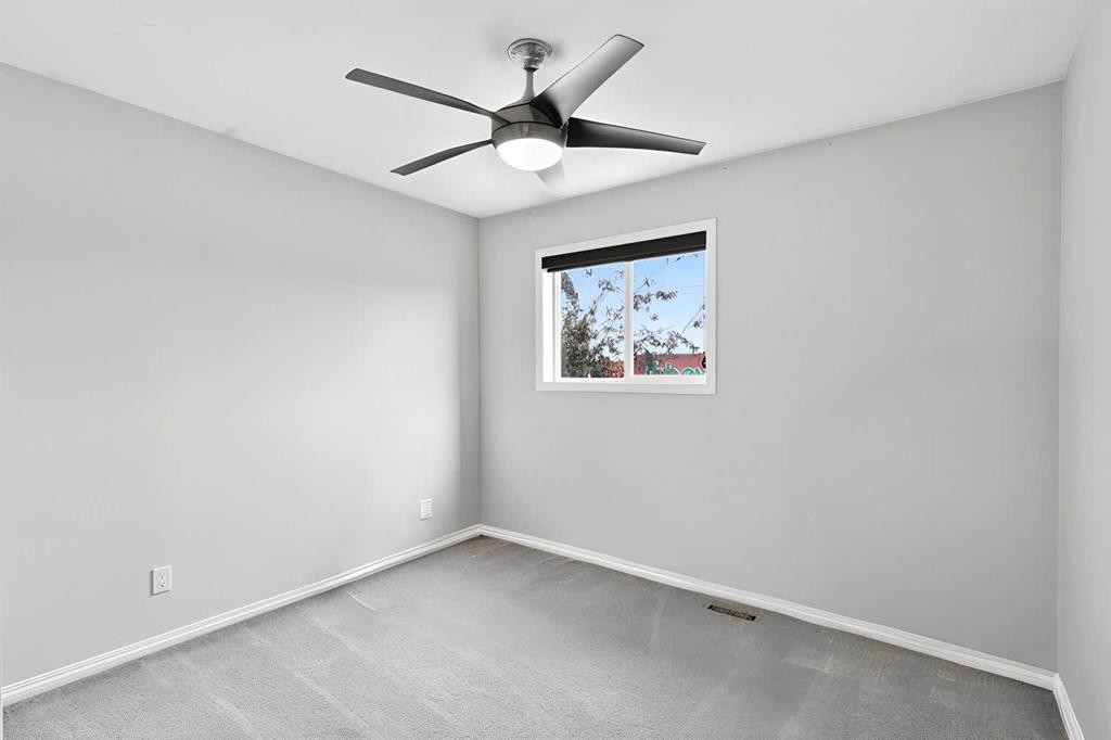 21-102 Canoe Square Sw, Airdrie, AB - Indoor Photo Showing Other Room