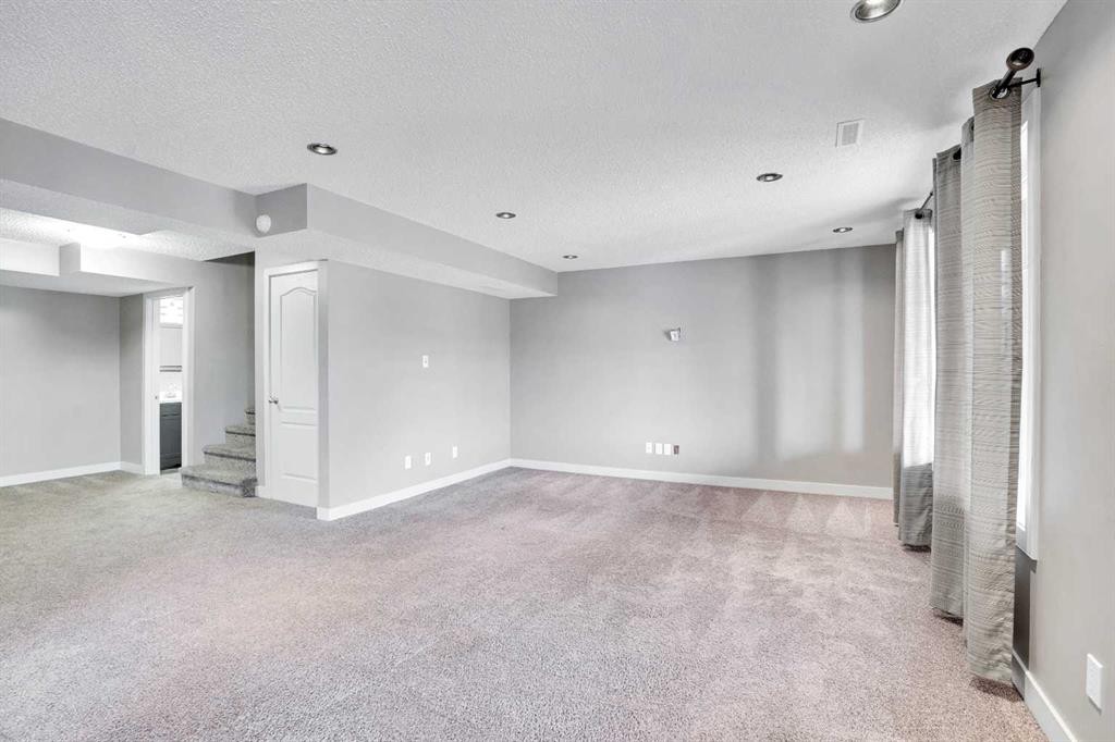 208 Sagewood Landing Sw, Airdrie, AB - Indoor Photo Showing Other Room