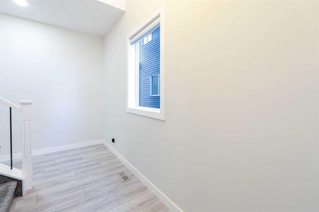15 Midgrove Drive Sw, Airdrie, AB - Indoor Photo Showing Other Room