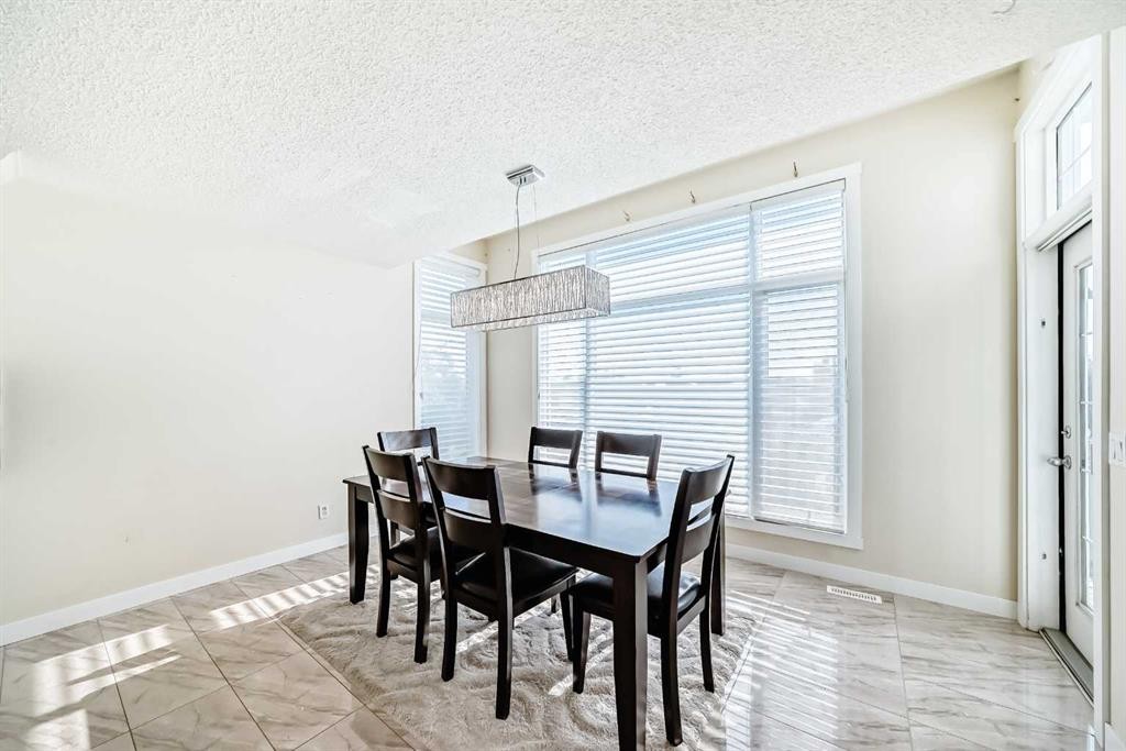 41 Covette Bay Ne, Calgary, AB - Indoor Photo Showing Dining Room