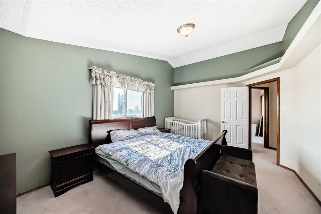 41 Covette Bay Ne, Calgary, AB - Indoor Photo Showing Bedroom