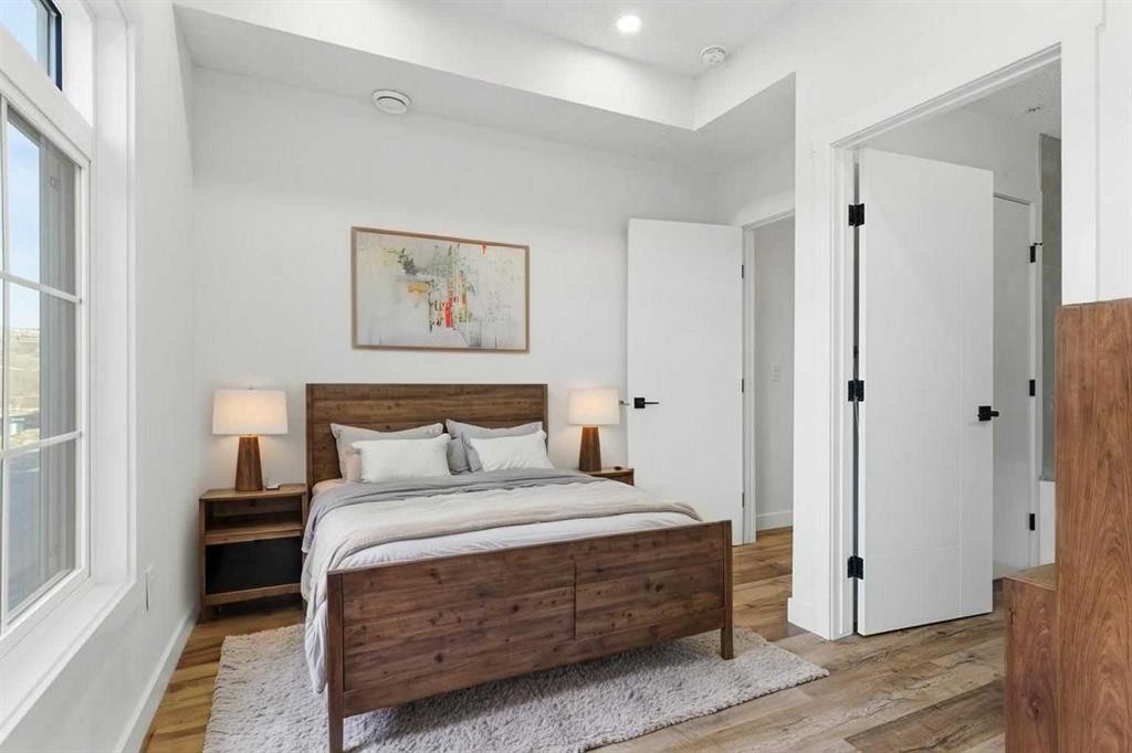 102-156 Park Street, Cochrane, AB - Indoor Photo Showing Bedroom