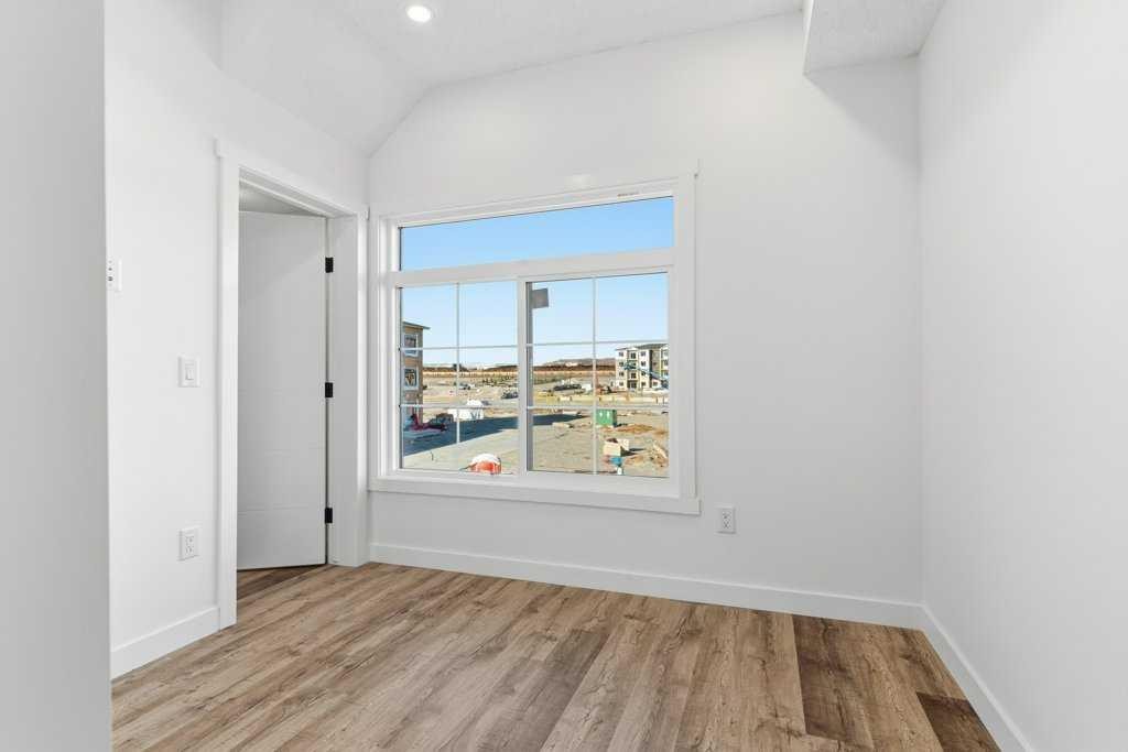 102-156 Park Street, Cochrane, AB - Indoor Photo Showing Other Room