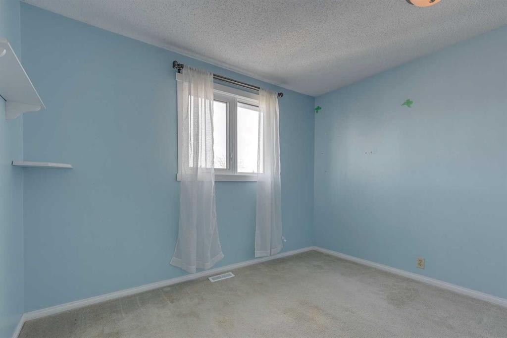 16 Abalone Crescent Ne, Calgary, AB - Indoor Photo Showing Other Room