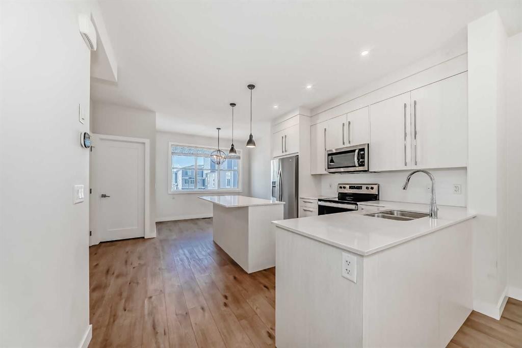 301-50 Cornerstone Passage, Calgary, AB - Indoor Photo Showing Kitchen With Double Sink With Upgraded Kitchen