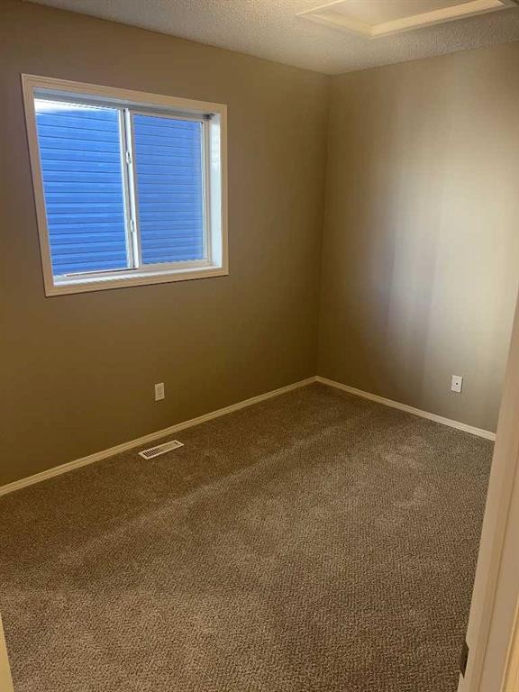 40 Bridlewood Gardens Sw, Calgary, AB - Indoor Photo Showing Other Room