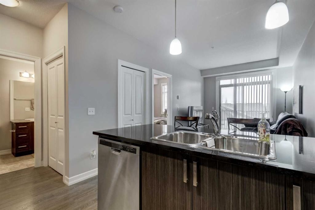 324-117 Copperpond Common Se, Calgary, AB - Indoor Photo Showing Kitchen With Double Sink