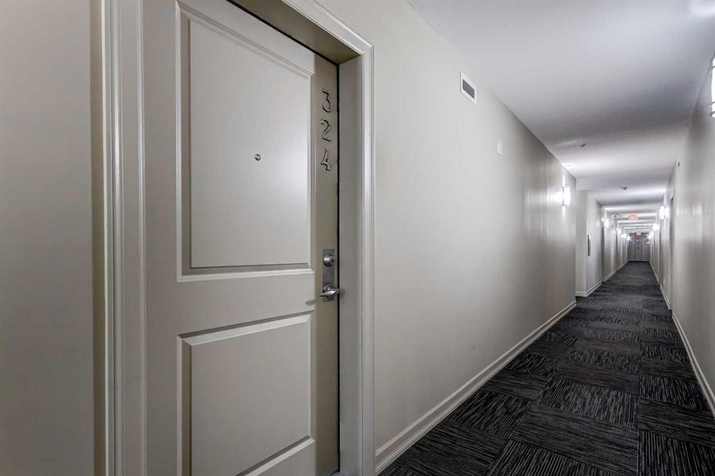 324-117 Copperpond Common Se, Calgary, AB - Indoor Photo Showing Other Room