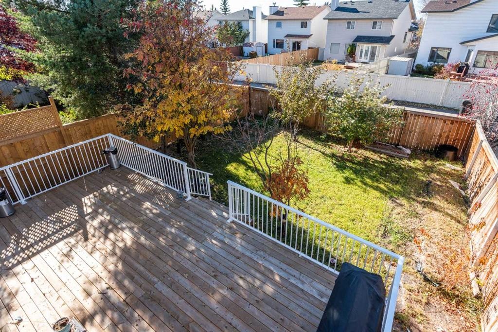 414 Mt Cornwall Circle Se, Calgary, AB - Outdoor With Deck Patio Veranda With Exterior