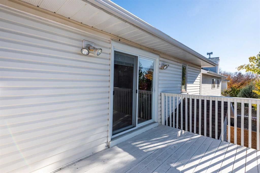 414 Mt Cornwall Circle Se, Calgary, AB - Outdoor With Deck Patio Veranda With Exterior