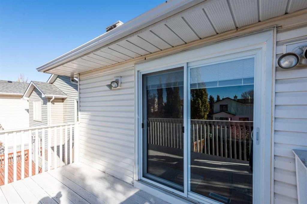 414 Mt Cornwall Circle Se, Calgary, AB - Outdoor With Deck Patio Veranda With Exterior