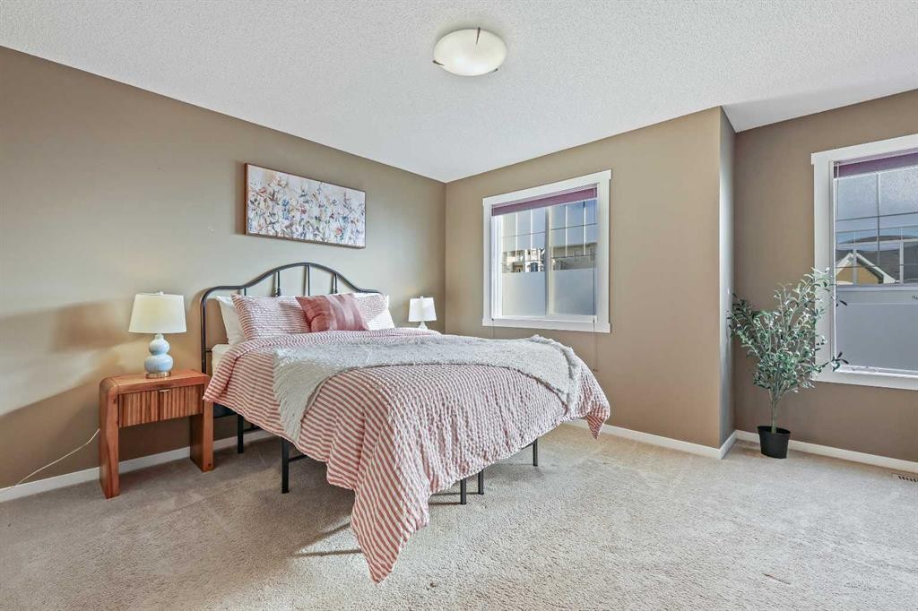 313 Auburn Bay Circle Se, Calgary, AB - Indoor Photo Showing Bedroom