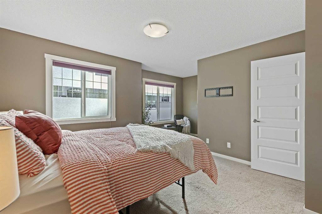 313 Auburn Bay Circle Se, Calgary, AB - Indoor Photo Showing Bedroom