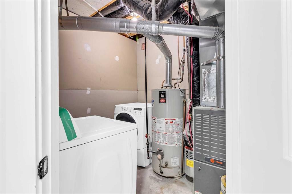 26 Saddlemont Road Ne, Calgary, AB - Indoor Photo Showing Laundry Room