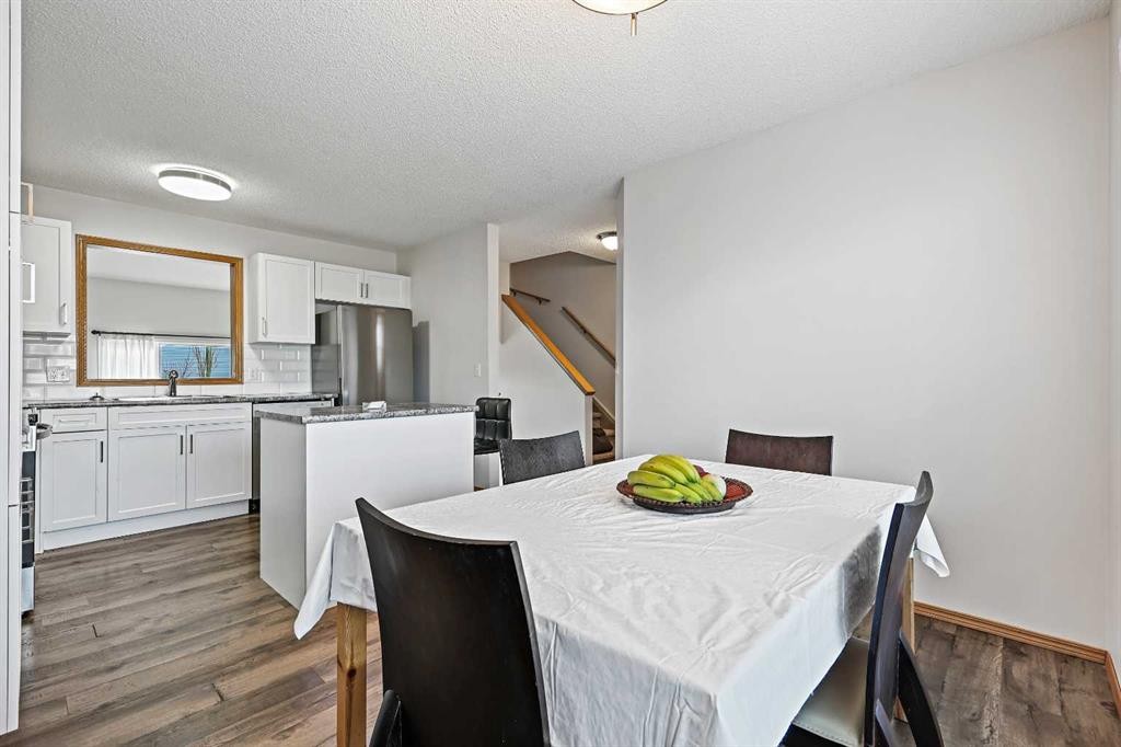 258 Rocky Ridge Court Nw, Calgary, AB - Indoor Photo Showing Dining Room