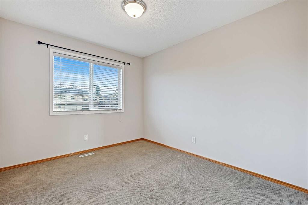 258 Rocky Ridge Court Nw, Calgary, AB - Indoor Photo Showing Other Room