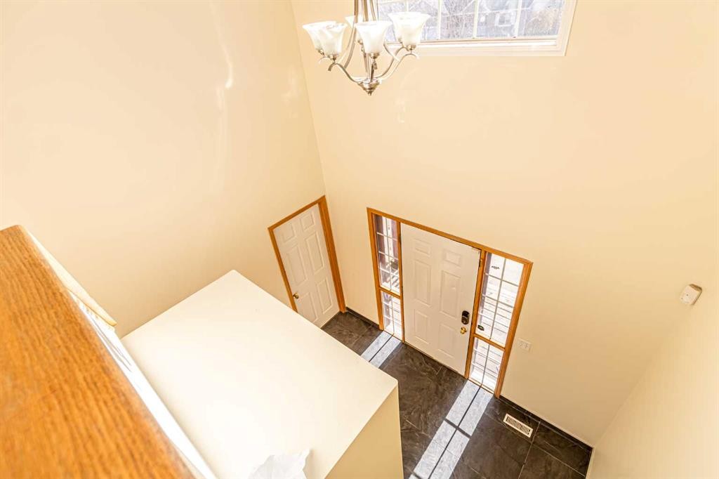 49 Welshimer Crescent Ne, Langdon, AB - Indoor Photo Showing Other Room