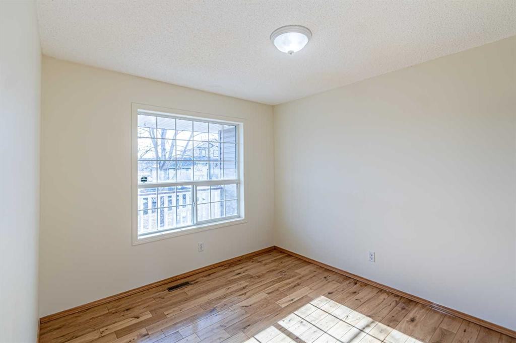 49 Welshimer Crescent Ne, Langdon, AB - Indoor Photo Showing Other Room