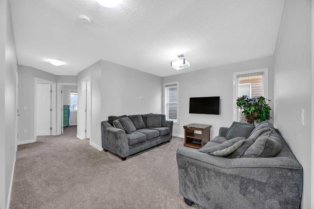 320 Nolancrest Circle Nw, Calgary, AB - Indoor Photo Showing Living Room With Fireplace