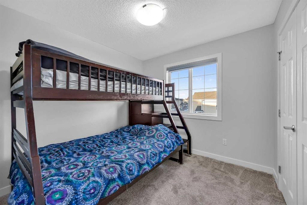 320 Nolancrest Circle Nw, Calgary, AB - Indoor Photo Showing Bedroom