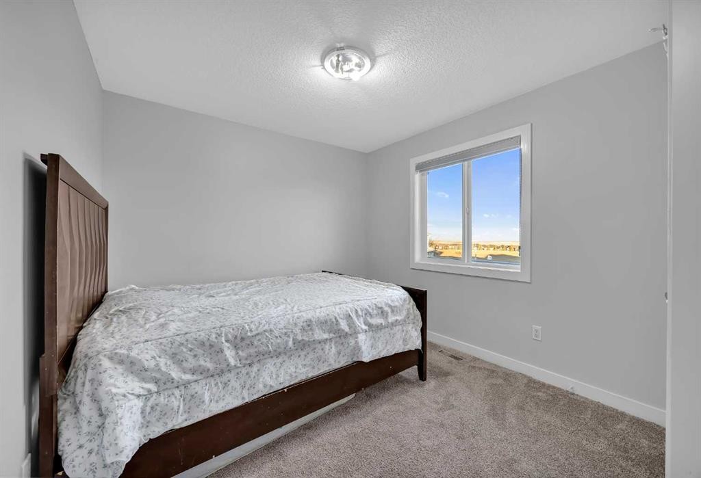 320 Nolancrest Circle Nw, Calgary, AB - Indoor Photo Showing Bedroom