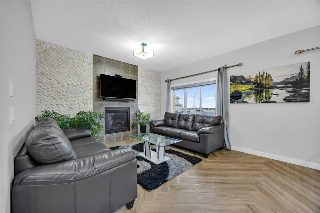 320 Nolancrest Circle Nw, Calgary, AB - Indoor Photo Showing Living Room With Fireplace