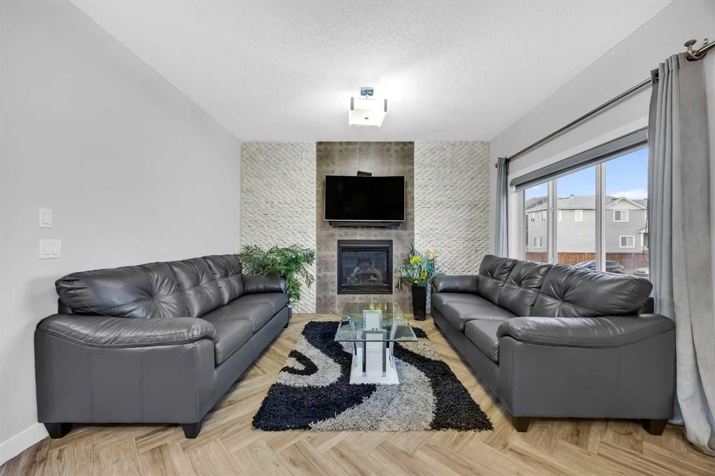 320 Nolancrest Circle Nw, Calgary, AB - Indoor Photo Showing Living Room With Fireplace