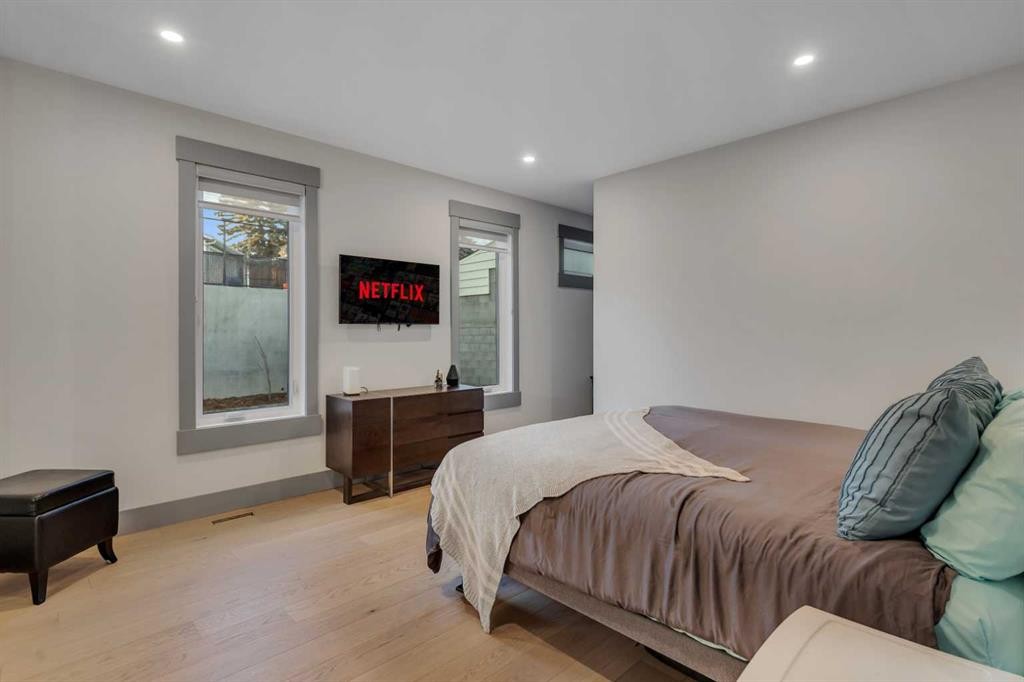 30 Roselawn Crescent Nw, Calgary, AB - Indoor Photo Showing Bedroom