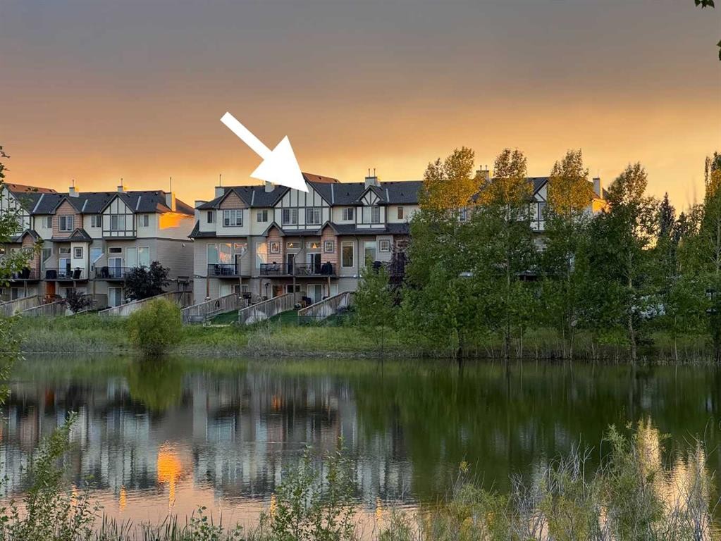 44 Everridge Common Sw, Calgary, AB - Outdoor With Body Of Water