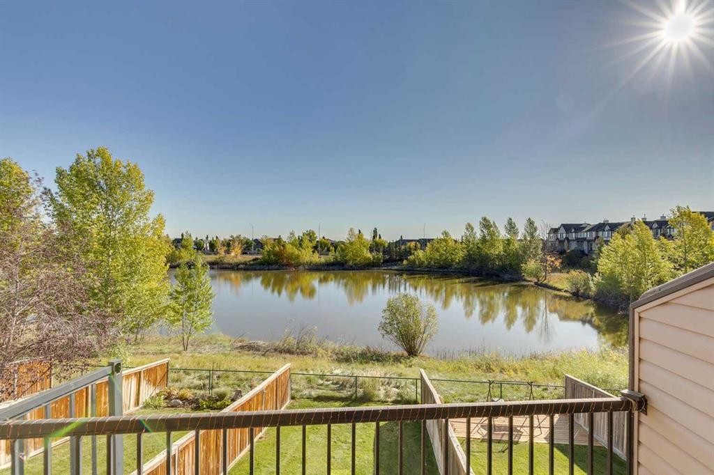 44 Everridge Common Sw, Calgary, AB - Outdoor With Body Of Water With Deck Patio Veranda With View