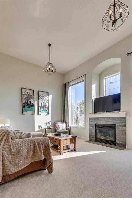 44 Everridge Common Sw, Calgary, AB - Indoor Photo Showing Living Room With Fireplace