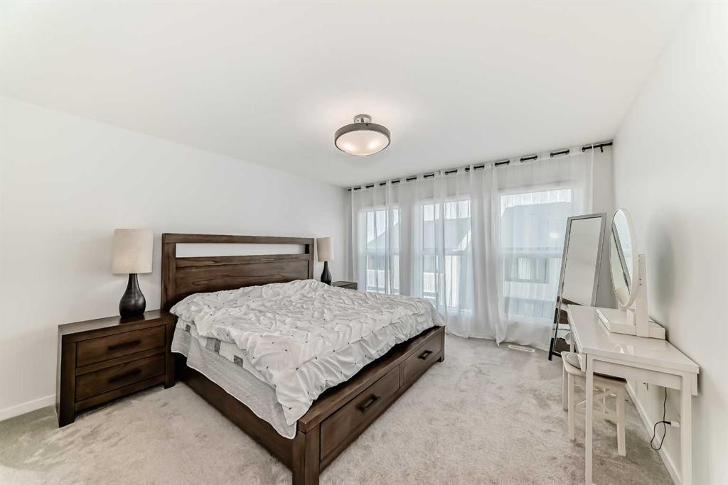 12 West Grove Link Sw, Calgary, AB - Indoor Photo Showing Bedroom
