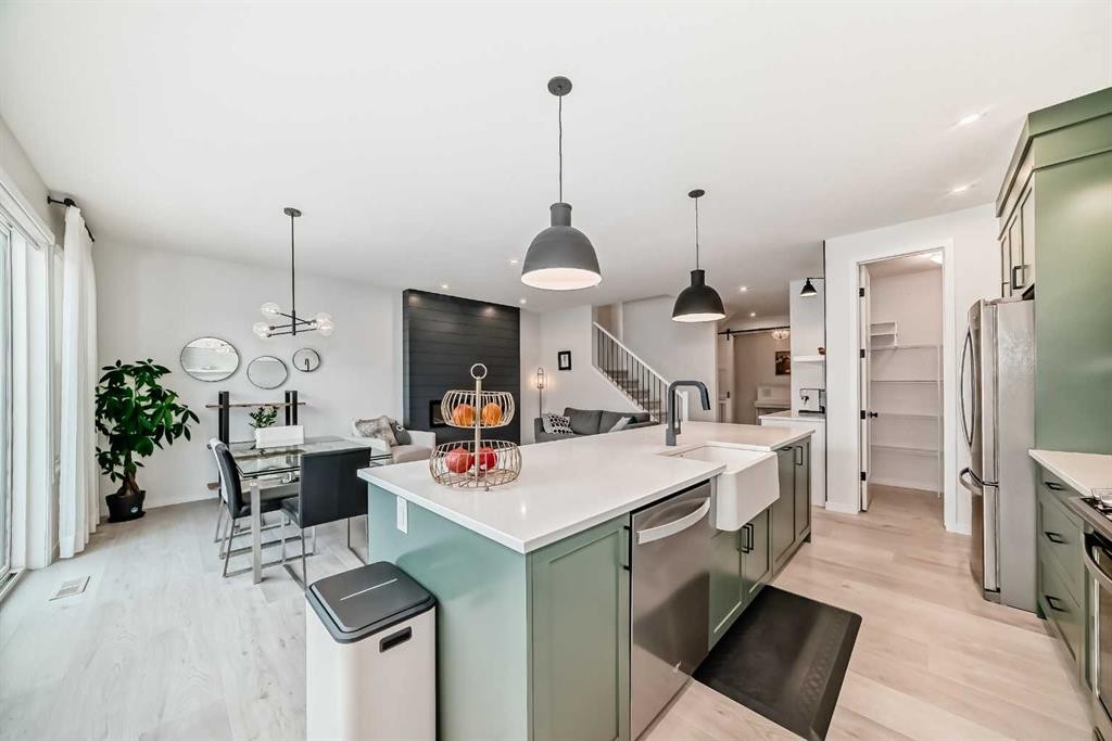 12 West Grove Link Sw, Calgary, AB - Indoor Photo Showing Kitchen With Upgraded Kitchen