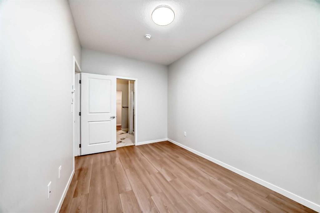404-80 Carrington Plaza Nw, Calgary, AB - Indoor Photo Showing Other Room