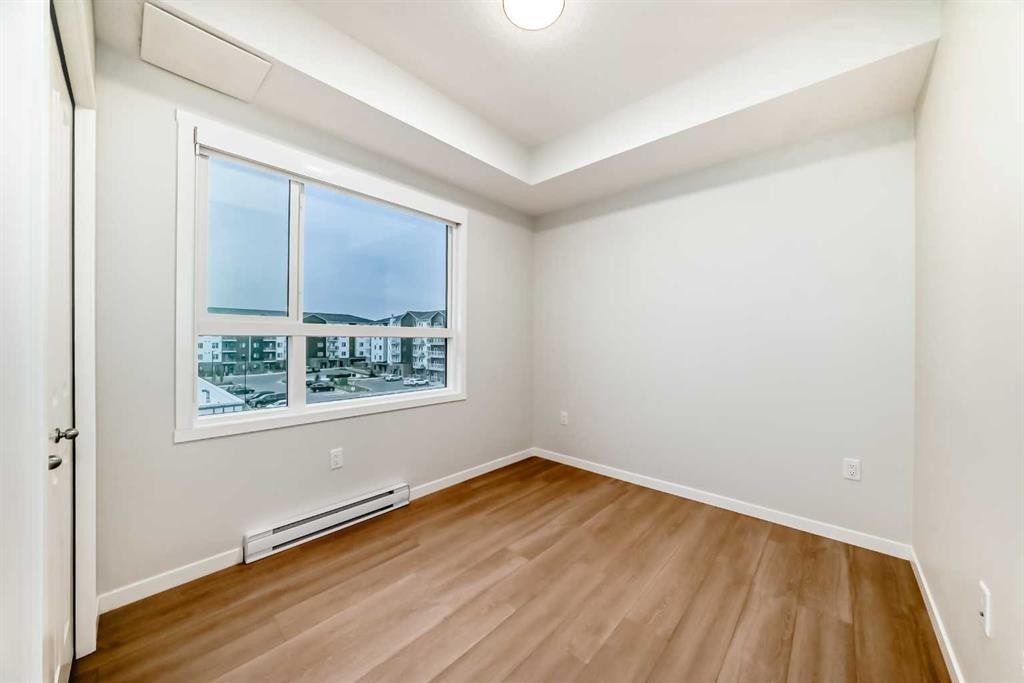 404-80 Carrington Plaza Nw, Calgary, AB - Indoor Photo Showing Other Room