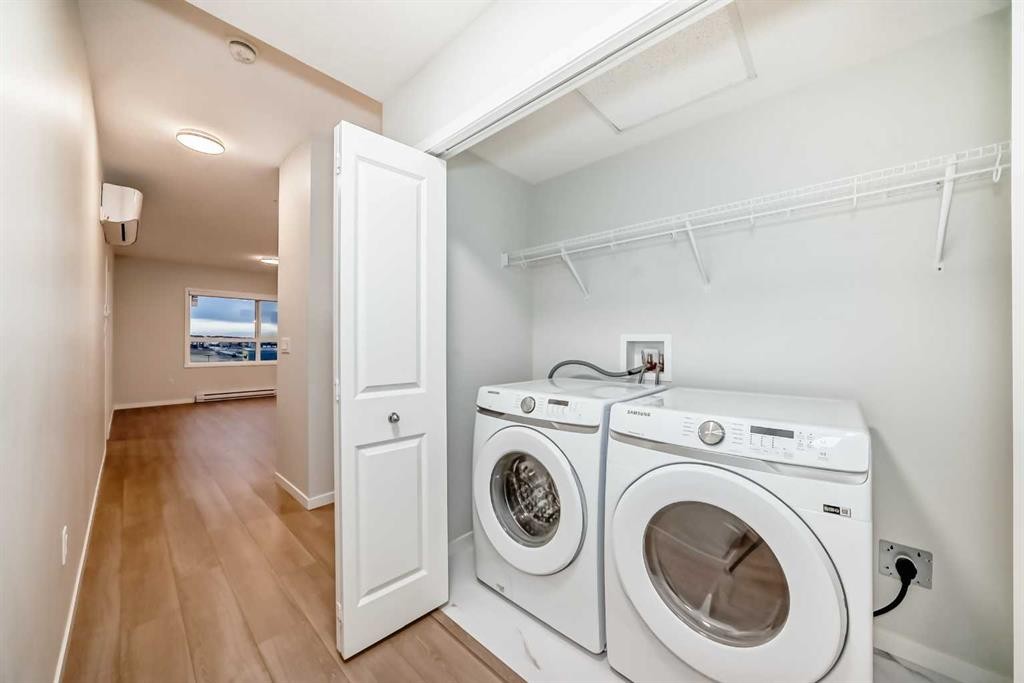 404-80 Carrington Plaza Nw, Calgary, AB - Indoor Photo Showing Laundry Room