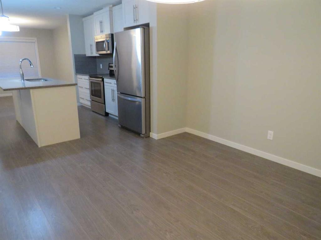 309 Evansridge Park Nw, Calgary, AB - Indoor Photo Showing Kitchen With Stainless Steel Kitchen