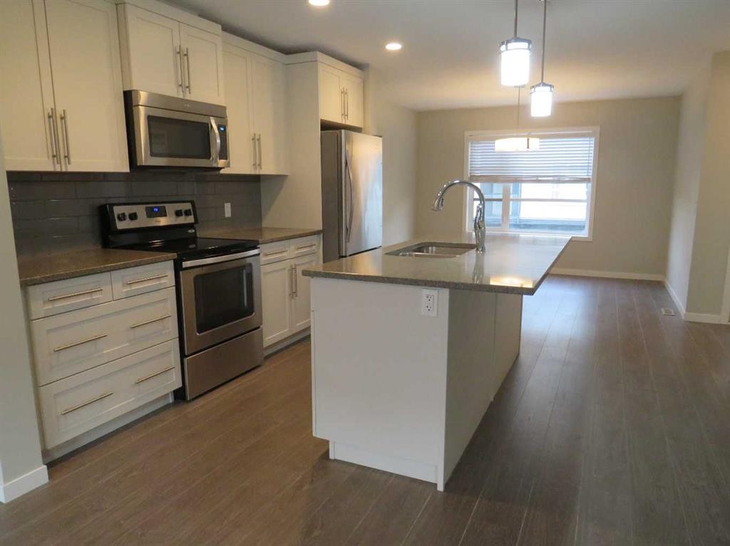 309 Evansridge Park Nw, Calgary, AB - Indoor Photo Showing Kitchen With Stainless Steel Kitchen With Upgraded Kitchen