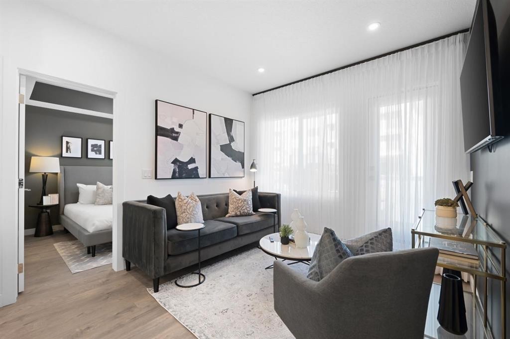 3314-6 Merganser Drive West, Chestermere, AB - Indoor Photo Showing Living Room