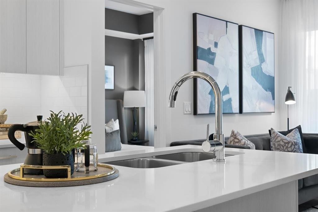 3314-6 Merganser Drive West, Chestermere, AB - Indoor Photo Showing Kitchen With Double Sink