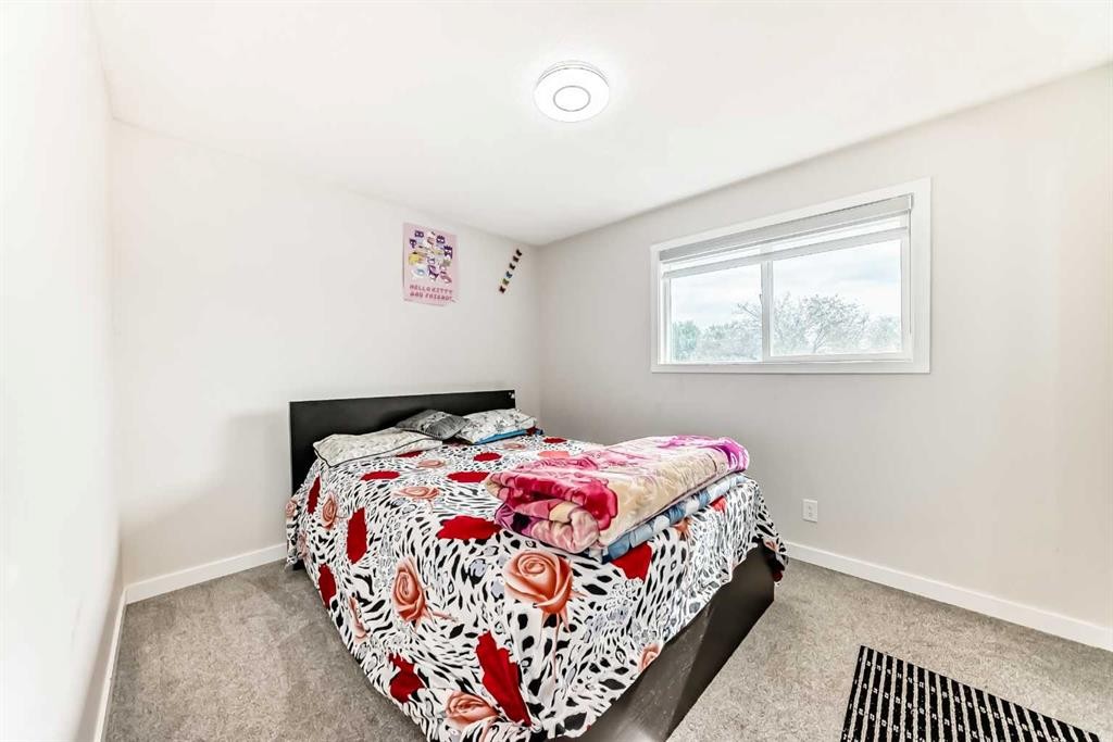 6712 23 Avenue Ne, Calgary, AB - Indoor Photo Showing Bedroom