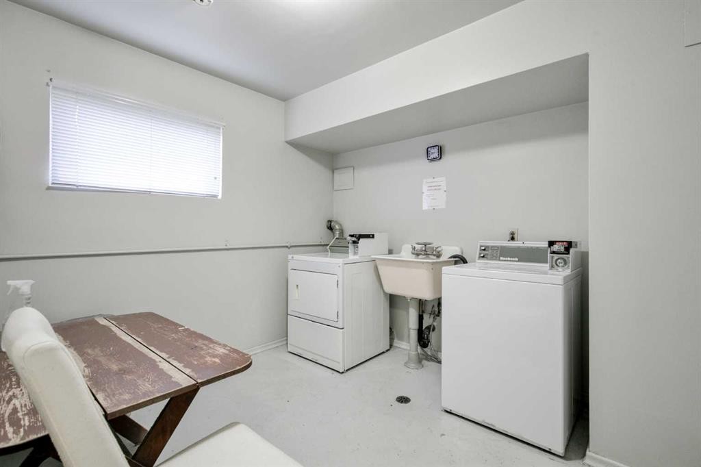 2705 38 Street Sw, Calgary, AB - Indoor Photo Showing Laundry Room