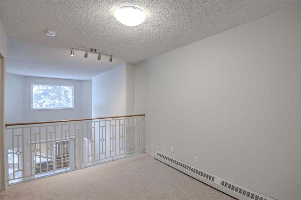 104-1720 13 Street Sw, Calgary, AB - Indoor Photo Showing Other Room