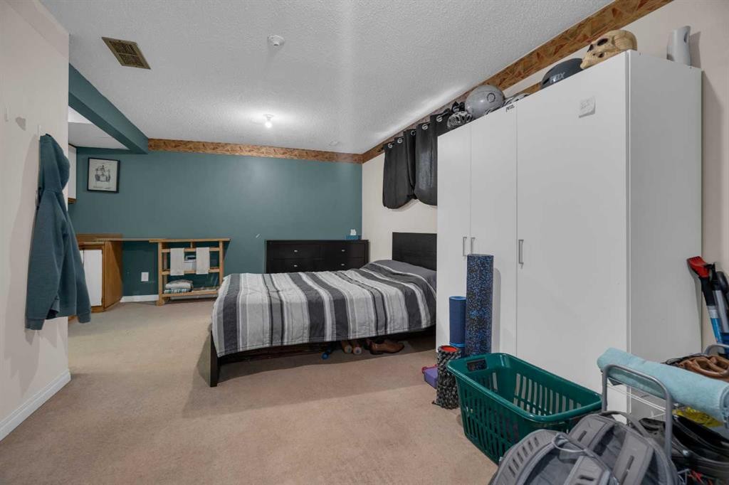 3 Booth Crescent, Irricana, AB - Indoor Photo Showing Bedroom