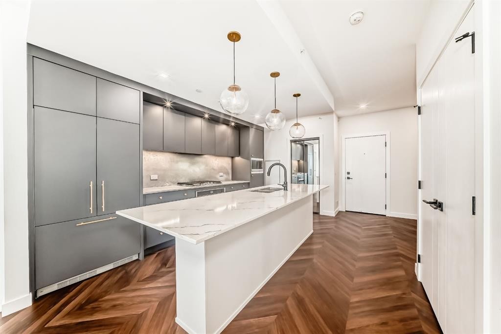 410-8505 Broadcast Avenue Sw, Calgary, AB - Indoor Photo Showing Kitchen With Upgraded Kitchen