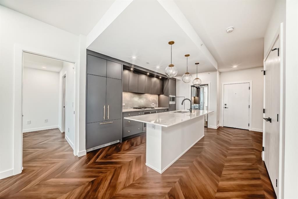 410-8505 Broadcast Avenue Sw, Calgary, AB - Indoor Photo Showing Kitchen With Upgraded Kitchen